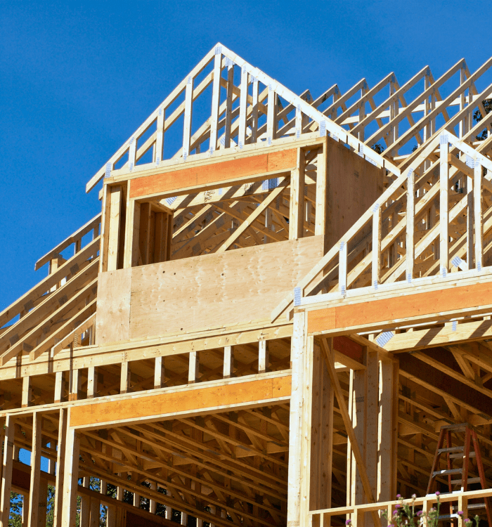 Complex roof truss and upper-level framing for a custom home in the Black Hills, SD.
