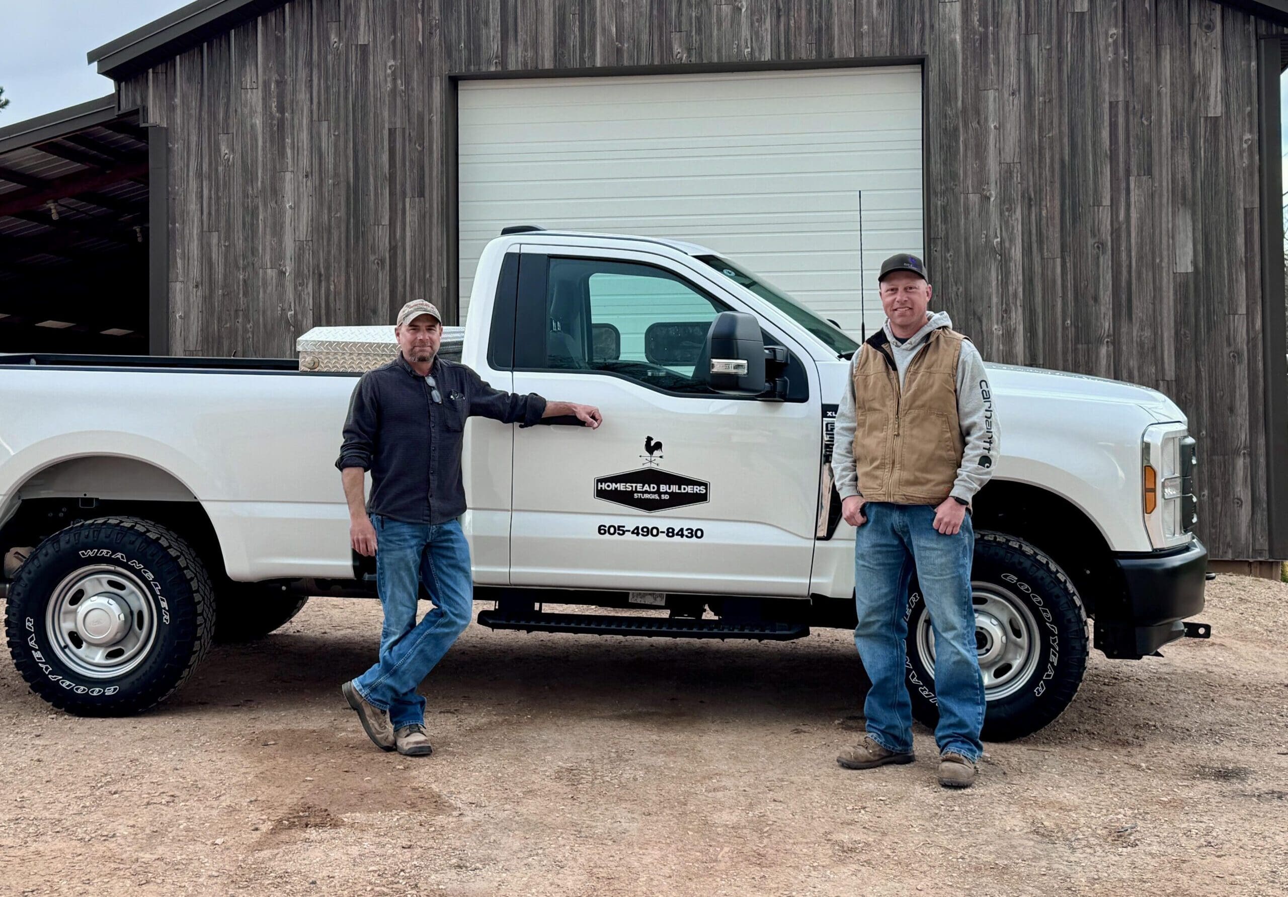 Homestead Builders Chris and Jared posed for a photo before heading to a jobsite