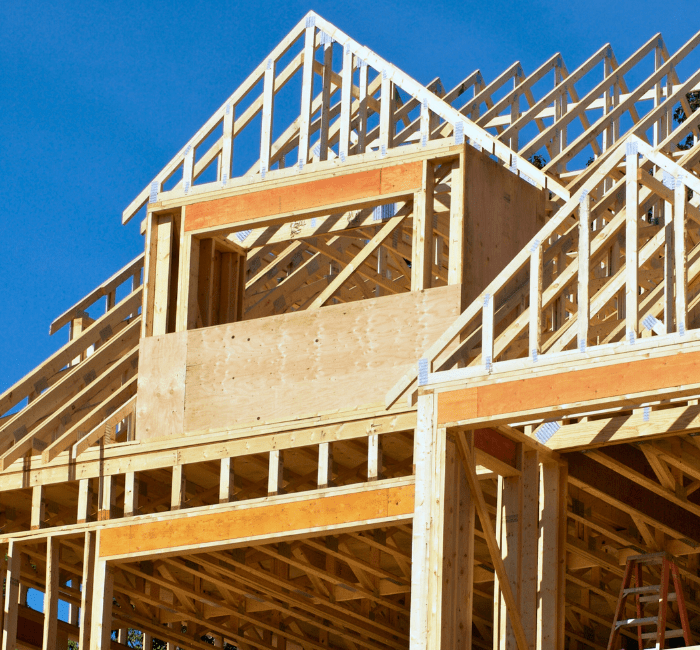 Complex roof truss and upper-level framing for a custom home in the Black Hills, SD.